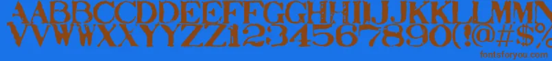 フォントStampact – 茶色の文字が青い背景にあります。