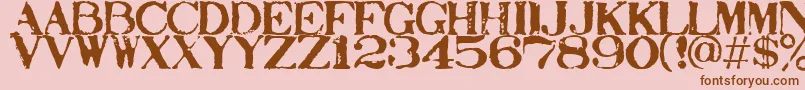 Stampact Font – Brown Fonts on Pink Background