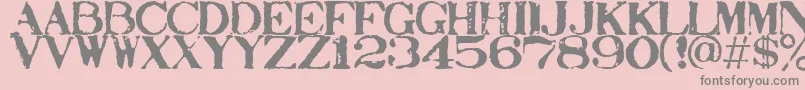 Stampact Font – Gray Fonts on Pink Background