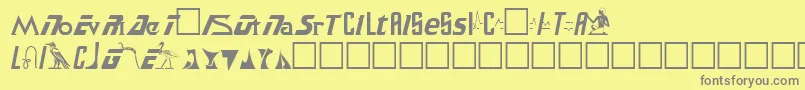 SafariPlain-fontti – harmaat kirjasimet keltaisella taustalla