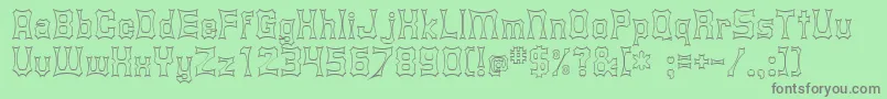 Shurkin-Schriftart – Graue Schriften auf grünem Hintergrund