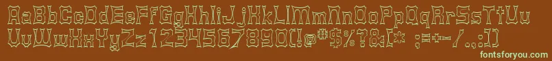 フォントShurkin – 緑色の文字が茶色の背景にあります。