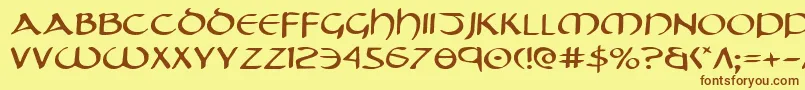 フォントTristramExpanded – 茶色の文字が黄色の背景にあります。