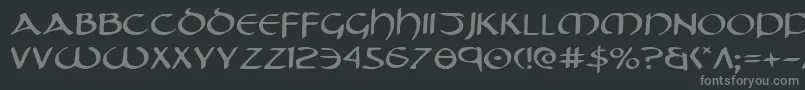 フォントTristramExpanded – 黒い背景に灰色の文字