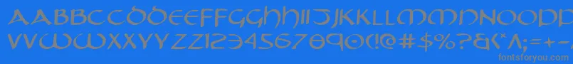 フォントTristramExpanded – 青い背景に灰色の文字