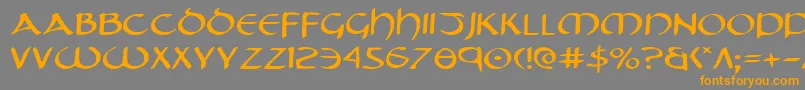 フォントTristramExpanded – オレンジの文字は灰色の背景にあります。