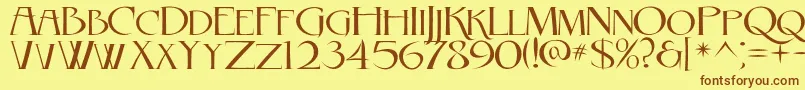 フォントRebelCaps2010 – 茶色の文字が黄色の背景にあります。