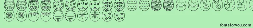 Fonte EasterEggsSt – fontes pretas em um fundo verde