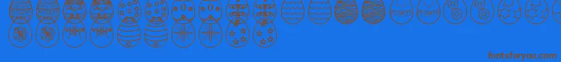 EasterEggsSt Font – Brown Fonts on Blue Background