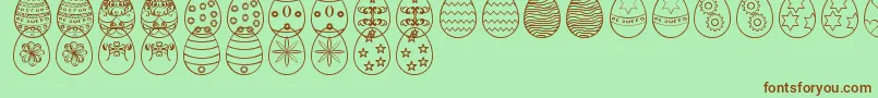 Шрифт EasterEggsSt – коричневые шрифты на зелёном фоне