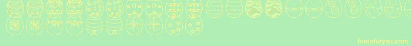Czcionka EasterEggsSt – żółte czcionki na zielonym tle