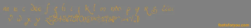 フォントBilbofine – オレンジの文字は灰色の背景にあります。