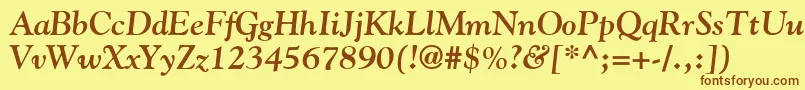 フォントGoudyBoldItalic – 茶色の文字が黄色の背景にあります。