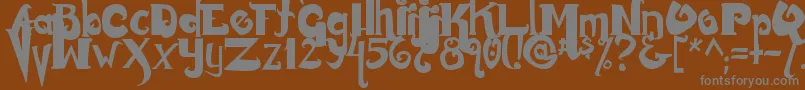 Monstur Font – Gray Fonts on Brown Background