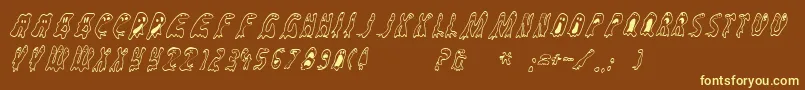 Groovyghosties-fontti – keltaiset fontit ruskealla taustalla
