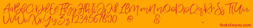 フォントJandysDua – オレンジの背景に赤い文字