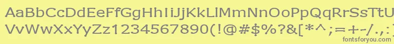 フォントDrummon – 黄色の背景に灰色の文字