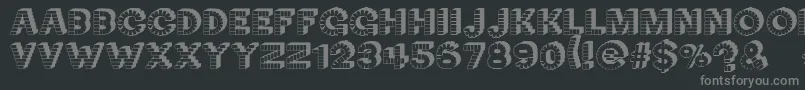 NeckCandy-fontti – harmaat kirjasimet mustalla taustalla