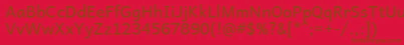 Andika Font – Brown Fonts on Red Background