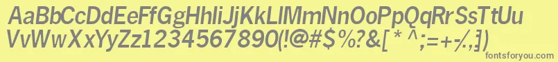 MacroblacksskItalic-fontti – harmaat kirjasimet keltaisella taustalla
