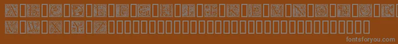 More about Goudyini Font Goudyini Font – Gray Fonts on Brown Background