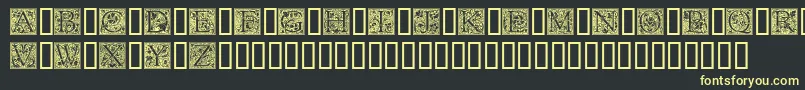 フォントGoudyini – 黒い背景に黄色の文字