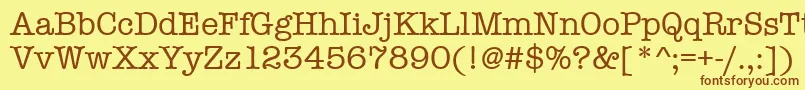 Amtypewritermditctt Font – Brown Fonts on Yellow Background