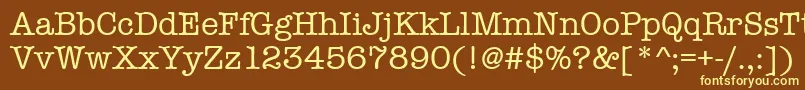 Amtypewritermditctt-fontti – keltaiset fontit ruskealla taustalla