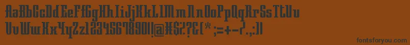 フォントNightTrain315 – 黒い文字が茶色の背景にあります