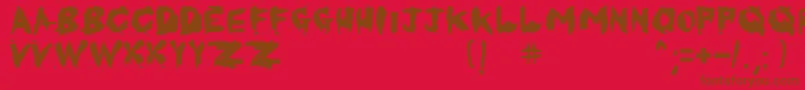 フォントKornnetTooItTalitm – 赤い背景に茶色の文字
