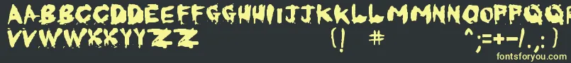 フォントKornnetTooItTalitm – 黒い背景に黄色の文字
