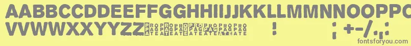 フォントPropagan – 黄色の背景に灰色の文字