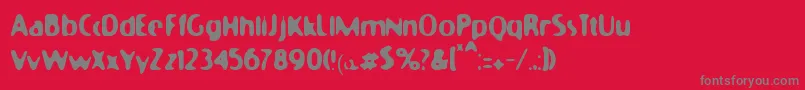 Moonycat-Schriftart – Graue Schriften auf rotem Hintergrund