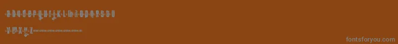 Ftkolari Font – Gray Fonts on Brown Background
