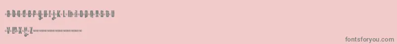 More about Ftkolari Font Ftkolari Font – Gray Fonts on Pink Background