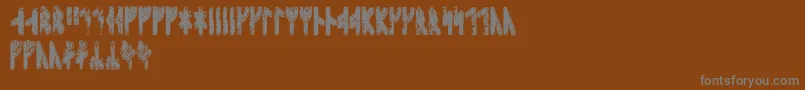 Sleipnirrunic-Schriftart – Graue Schriften auf braunem Hintergrund