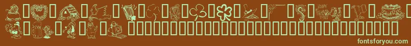 フォントKrIrishKat1 – 緑色の文字が茶色の背景にあります。