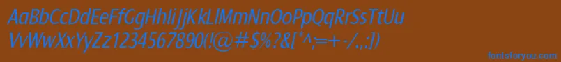 Czcionka DialogCondItalic – niebieskie czcionki na brązowym tle