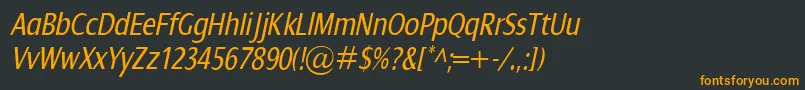 Czcionka DialogCondItalic – pomarańczowe czcionki na czarnym tle
