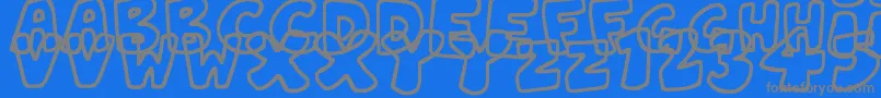 JellyWobblers-fontti – harmaat kirjasimet sinisellä taustalla