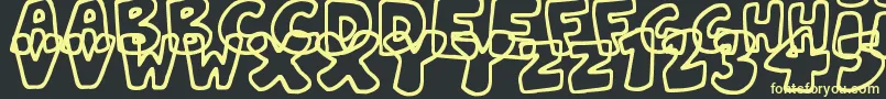 Saiba mais sobre a fonte JellyWobblers Fonte JellyWobblers – fontes amarelas em um fundo preto