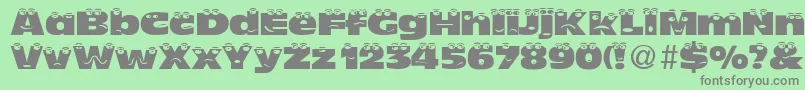 TheLookNormalDb Font – Gray Fonts on Green Background