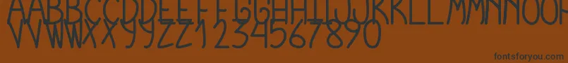Police CursiExtraTfbBold – polices noires sur fond brun