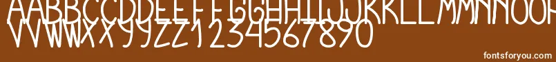 フォントCursiExtraTfbBold – 茶色の背景に白い文字