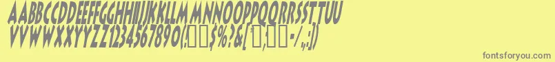 LithocomixItalic-fontti – harmaat kirjasimet keltaisella taustalla