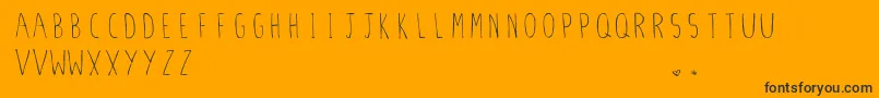 StilettoSkinny.Vfb Font – Black Fonts on Orange Background