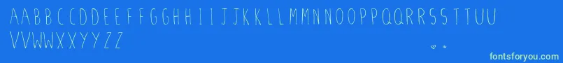 StilettoSkinny.Vfb Font – Green Fonts on Blue Background