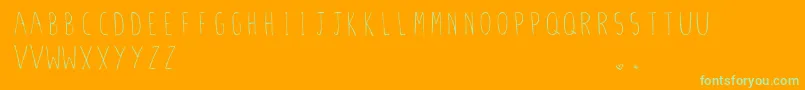 StilettoSkinny.Vfb-fontti – vihreät fontit oranssilla taustalla