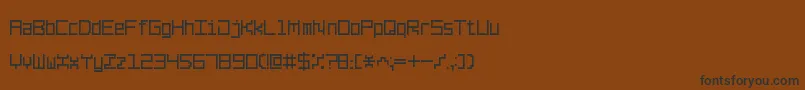 Fonte LinePixel7 – fontes pretas em um fundo marrom