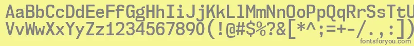 Nk57MonospaceScSb Font – Gray Fonts on Yellow Background